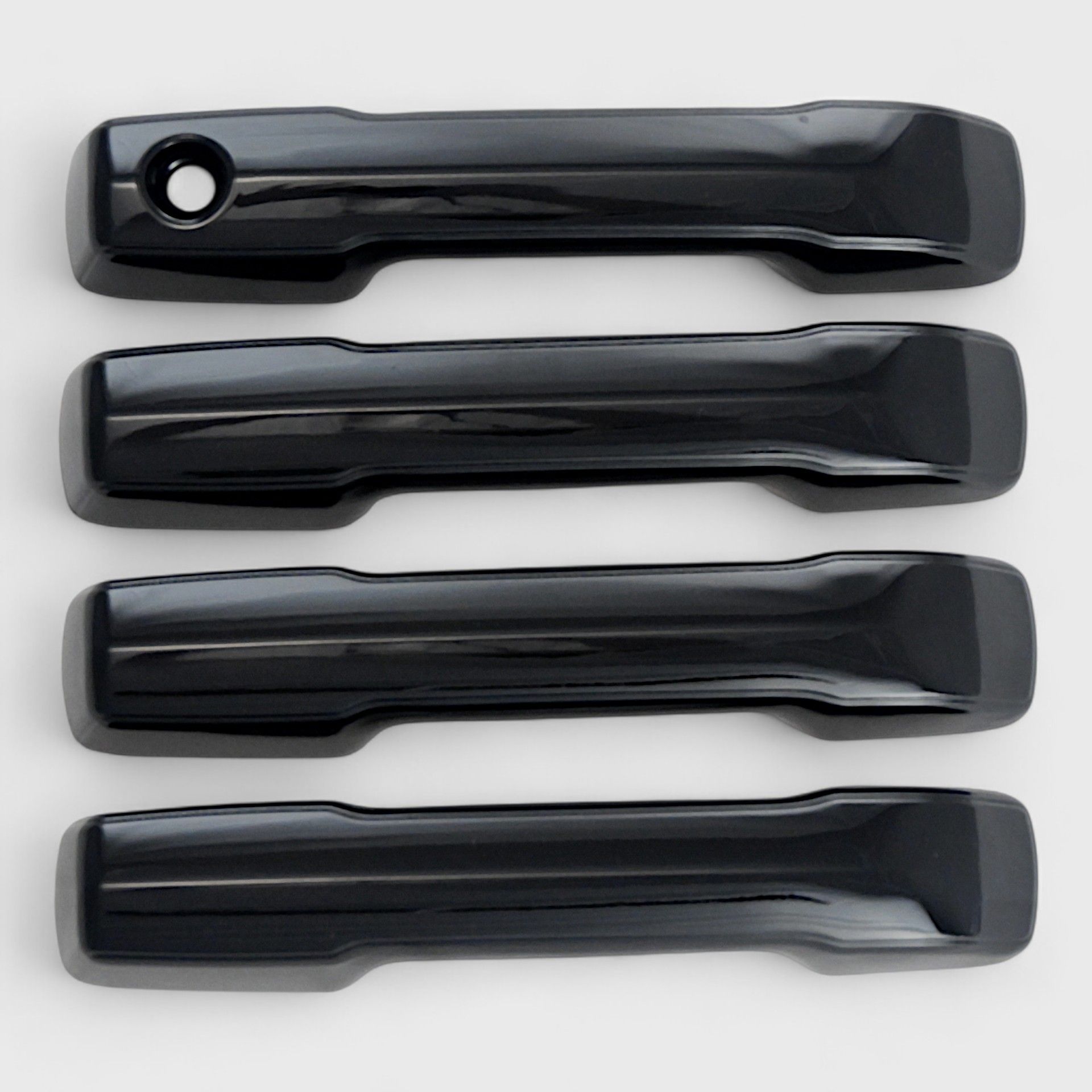 22-26 Toyota Tundra, 23-26 Toyota Sequoia, 24-26 Toyota Tacoma, 25-26 Toyota 4Runner Works over Keyless Sensors 4 Piece Gloss Black Snap-on W/Tape Patented Door Handle Cover